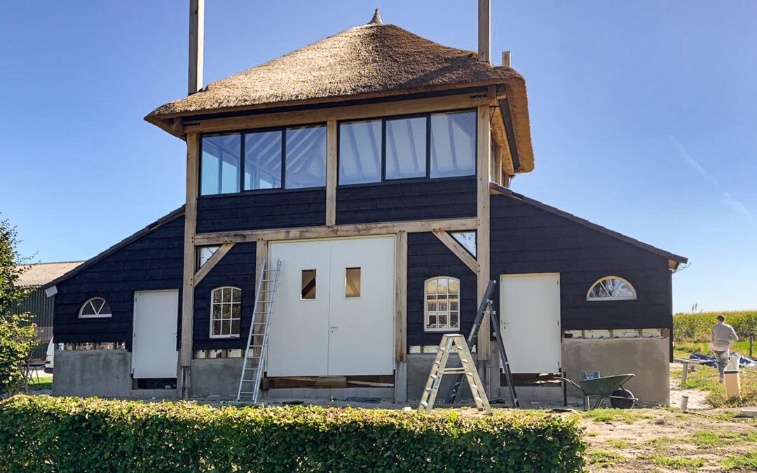 Woonhuis met bijgebouw en kantoorruimte